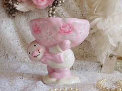 Cute Snowman Updo Carrying a Pink Rose Bowl